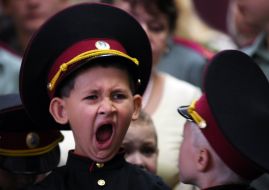 A first-class boy yawns