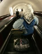 Passengers on the escalator