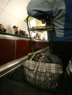 Passengers on the escalator