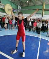 Boy lifts weight