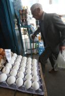 An old man chooses foods