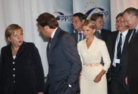 Yuliya Timoshenko, Angela Merkel and Grigoriy Nemyrya