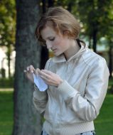 Students folding paper origami