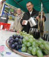 A man pours mulled wine