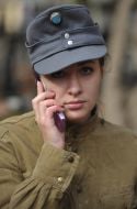 Участница реконструкции боя