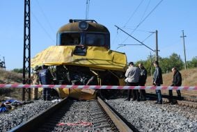 Clash of the bus and a locomotive