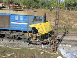 Clash of bus and locomotive