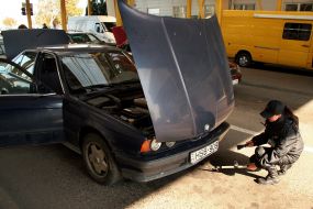 Border Guard inspects a car