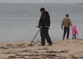 Man with a metal seeker