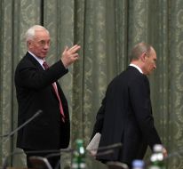 Nikolay Azarov and Vladimir Putin