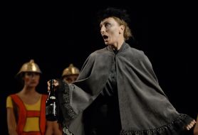 Scene from the performance-musical ”Biderman and incendiaries”