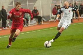 Evgueniy Pisotskiy and Lukas Tesak