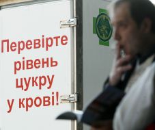 Passer-by near a placard