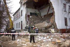 Collapse of part of wall of school