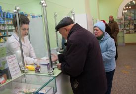 The pharmacist sells drugs