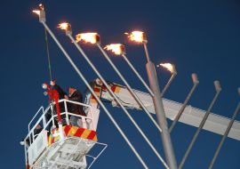 Vadim Rabinovich lights the candles on the minor