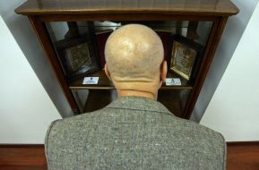 A visitor examines icons