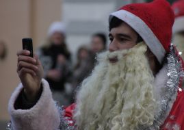 Grandfather Frost with a mobile telephone