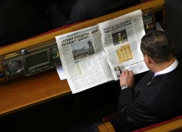 People’s deputy reads the newspaper