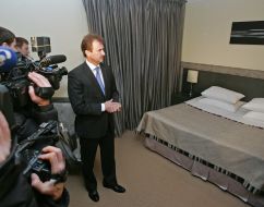 Alexandr Popov examining room