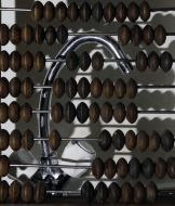 Abacus on a background a faucet