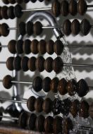Abacuses on a background a faucet