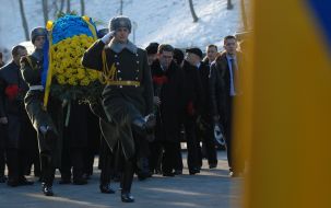 Ceremony of laying-on of flowers to the memorable sign to Heroes Kruty