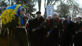 Ceremony of laying-on of flowers to the memorable sign to Heroes Kruty