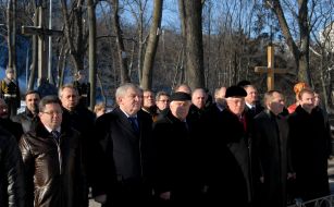 Participants of laying-on of flowers to the memorable sign to Heroes Kruty