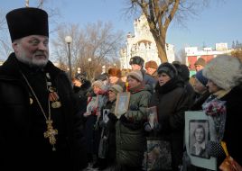 Relatives held pictures of soldiers killed in Afghanistan