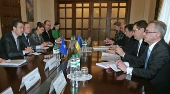 Костянтин Грищенко та Андерс Фог Расмуссен