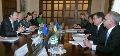 Костянтин Грищенко та Андерс Фог Расмуссен