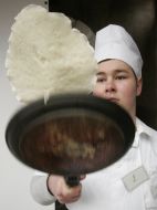 Учасник фестивалю млинців