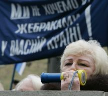 Участниця митинга