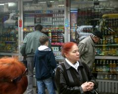 Inhabitants of Kiev near a street kiosk