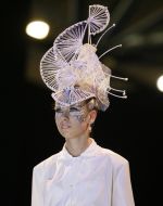 A model demonstrates a hair-do