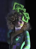 A model demonstrates a hair-do