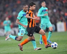 Eduardo da Silva and Seydou Keita