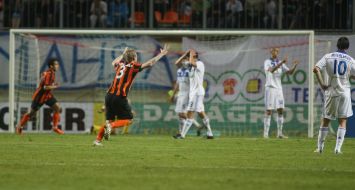 Eduardo da Silva and Tomas Hubschman rejoice after a goal