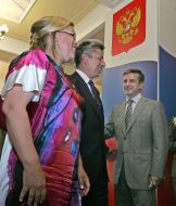 Yuriy and Vera Boyko, and Mihail Zurabov
