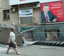 Destroyed entrance of the office of of Justice (Spravedlivost) party