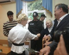 Yuliya Timoshenko, Anatoliy Gritsenko and Mikhail Livinskiy