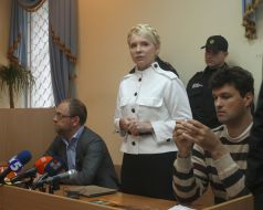 Yulia Timoshenko, Sergey Vlasenko and Mikhail Livinskiy