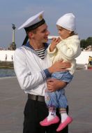 A sailor with a child