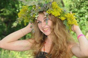 A girl in the crown of wild flowers