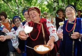 Women offer dumplings