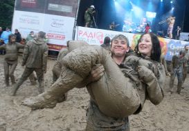 Youth, smeared with mud