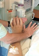 Hands of doctor and Leonid Stadnik