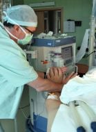 Hands of doctor and Leonid Stadnik