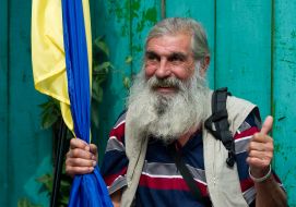 Участник митинга в поддержку пенсионной реформы